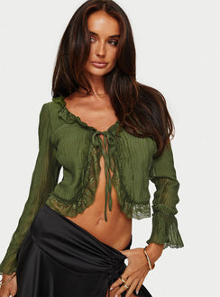 front view of model wearing Princess Polly Kareela Long Sleeve Top Green Full Sleeves V-Neck 