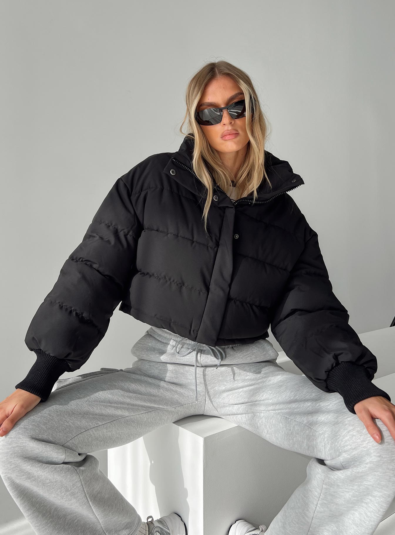Puffer jacket Snap button fastening at front, mock neck, ribbed cuffs, adjustable drawstring around waist Non-stretch, fully lined Princess Polly Lower Impact 