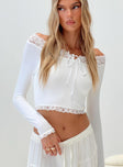 Off the shoulder crop top Lace trim at shoulders & hem, tie detail at bust Good stretch, unlined  Princess Polly Lower Impact