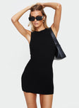 front view of model wearing Princess Polly Osment Knit Mini Dress Black Petite Crew Neck 