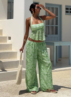 front view of model wearing Princess Polly Finesse Pants Green Floral High Waisted Pants 