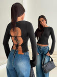 back view of model wearing Princess Polly Lifes Good Long Sleeve Backless Top Black Full Sleeves Crew Neck 