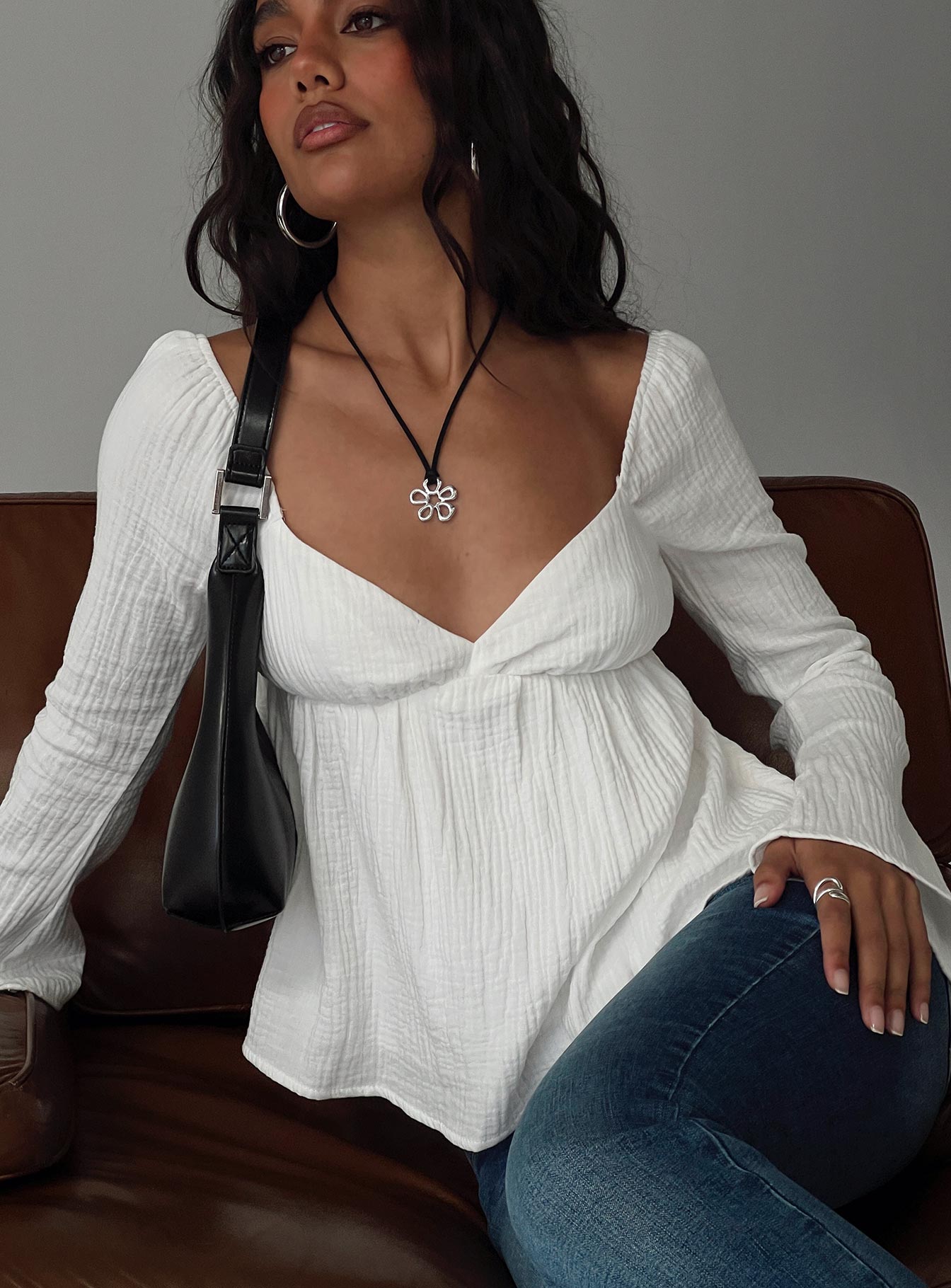 front view of model wearing Princess Polly Khalea Long Sleeve Top White Full Sleeves Sweetheart 