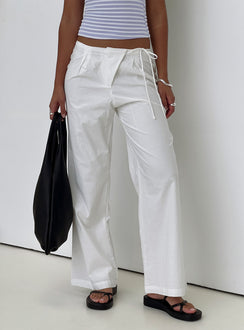 front view of model wearing Princess Polly Leyah Tie Side Pants White Low Rise Pants 