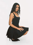 side view of model wearing Princess Polly Straplie Mini Dress Black Square Neck 