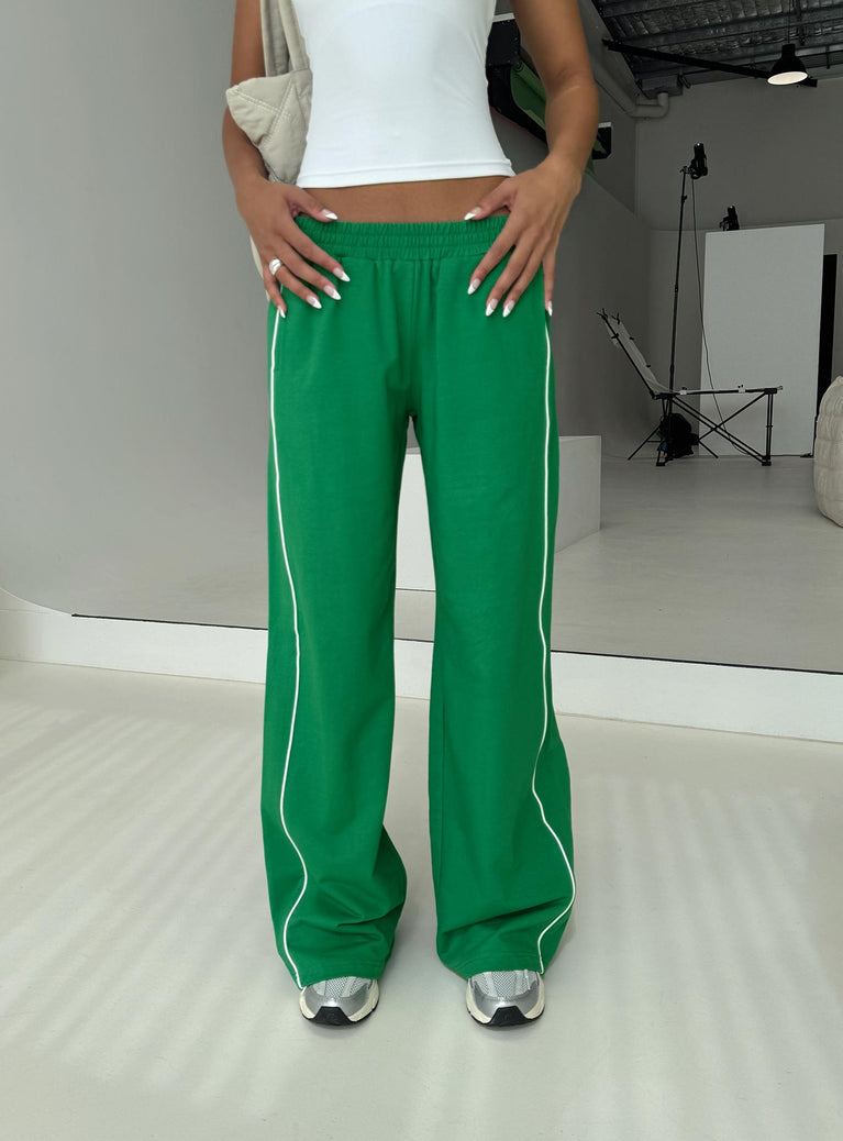 front view of model wearing Princess Polly Field Day Track Pants Green High Waisted Pants 