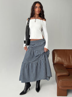   side view of model wearing Princess Polly Rockwell Tiered Midi Skirt Navy Check Maxi 