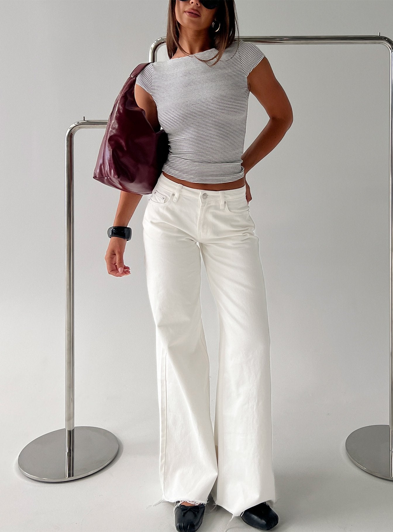 front view of model wearing Princess Polly Darla Low Rise Straight Leg Jean White Low Rise Jeans 