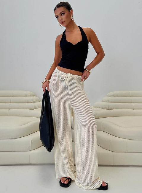 side view of model wearing Princess Polly Darcie Knit Pants Beige High Waisted Pants 