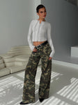 side view of model wearing Princess Polly Briony Jeans Camouflage Low Rise Jeans 