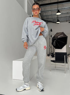 front view of model wearing Princess Polly Princess Polly Track Pants Cursive Text Grey Marle/ Red High Waisted Pants 