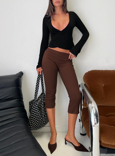 front view of model wearing Princess Polly Baseline Rib Capri Pants Chocolate Mid Rise Pants 