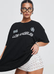 front view of model wearing Princess Polly Goal La Oversized Tee Black Half Sleeves Crew Neck 