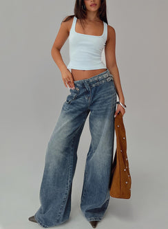 front view of model wearing Princess Polly Paltrow Cargo Jeans Mid Blue Wash Mid Rise 