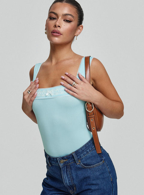 side view of model wearing Princess Polly Keating Bodysuit Baby Blue Sleeveless Square Neck 
