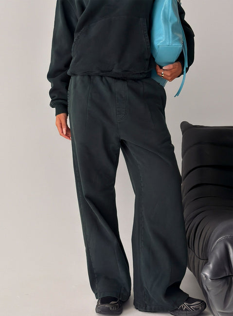 Crafted from black Baggy Sweatpant in womens regular pants with wide-leg mid-rise design front view of model wearing Princess Polly