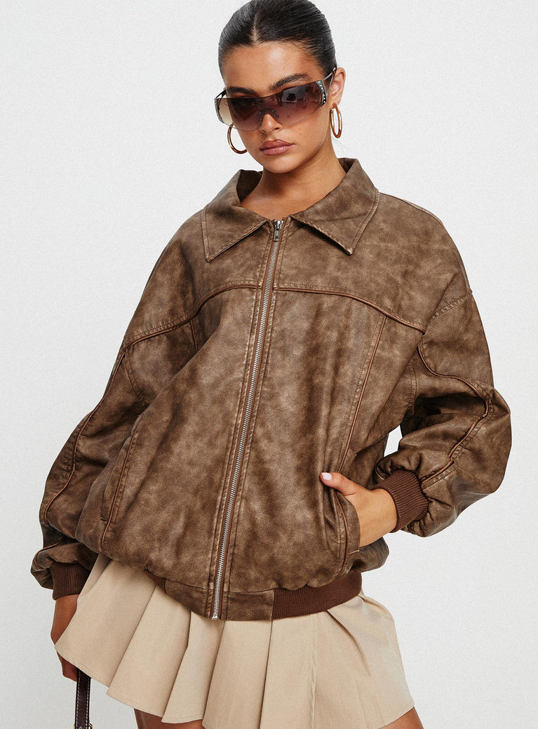 Bomber jacket  Faux leather material, oversized fit, classic collar, ribbed waistband and cuffs  Zip front fastening, twin hip pockets 