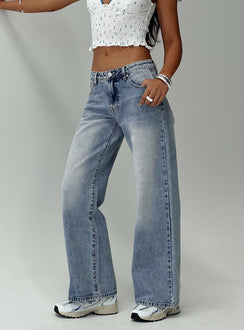 back view of model wearing Princess Polly Ronine Low Rise Wide Leg Jean Light Wash Low Rise Jeans 