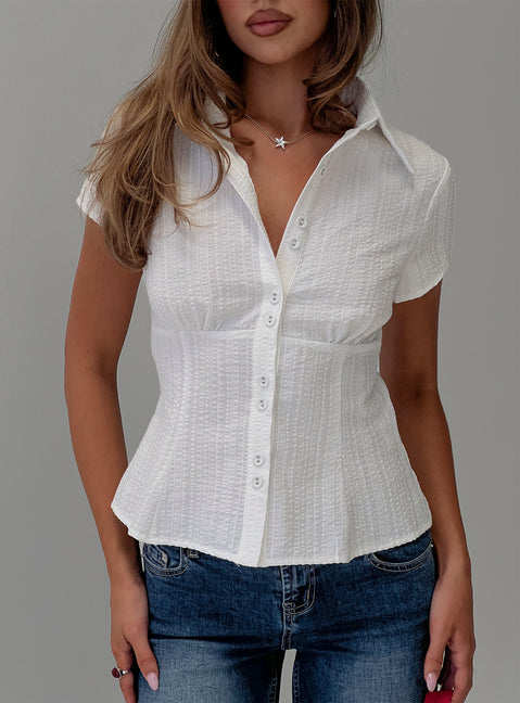 front view of model wearing Princess Polly Cottesloe Blouse Top Textured White Short Sleeves V-Neck 