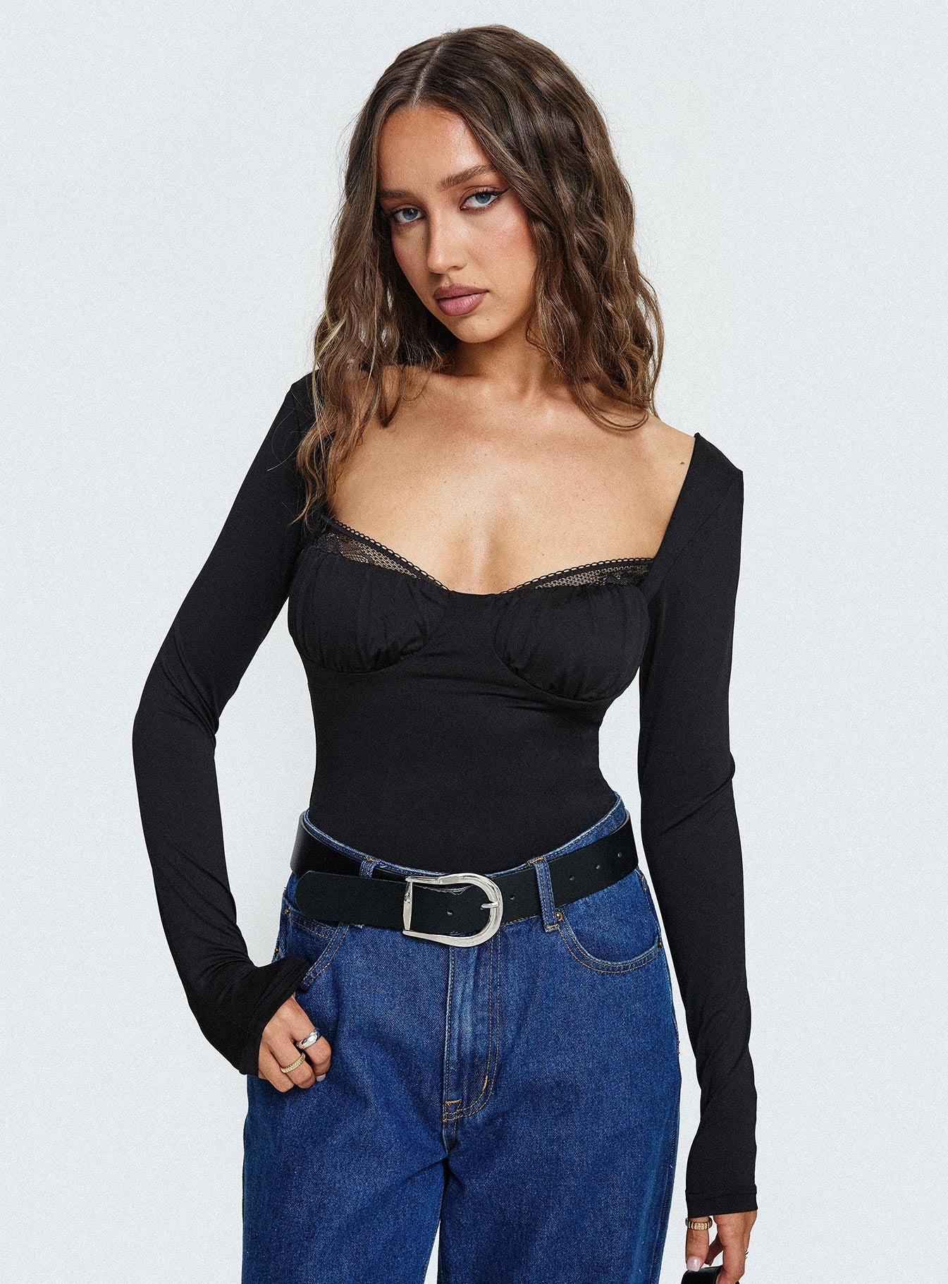 front view of model wearing Princess Polly Peekaboo Long Sleeve Bodysuit Black Full Sleeves Sweetheart 