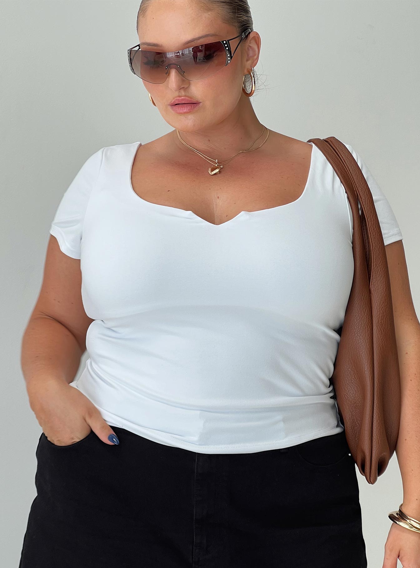 front view of model wearing Princess Polly Serenie Top Ice Curve Short Sleeves V-Neck 