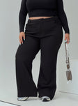 side view of model wearing Princess Polly Lulu Pants Black Curve High Waisted Pants 