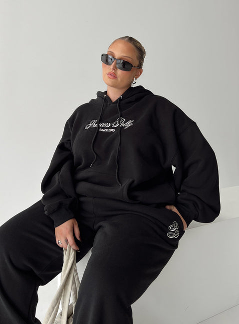 front view of model wearing Princess Polly Princess Polly Hooded Sweatshirt Script Black / Ivory Curve 