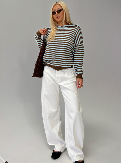 side view of model wearing Princess Polly Kaio Mid Rise Barrel Leg Denim Jeans White Mid Rise Jeans 