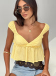 front view of model wearing Princess Polly Contardo Short Sleeve Top Yellow Short Sleeves Plunger 