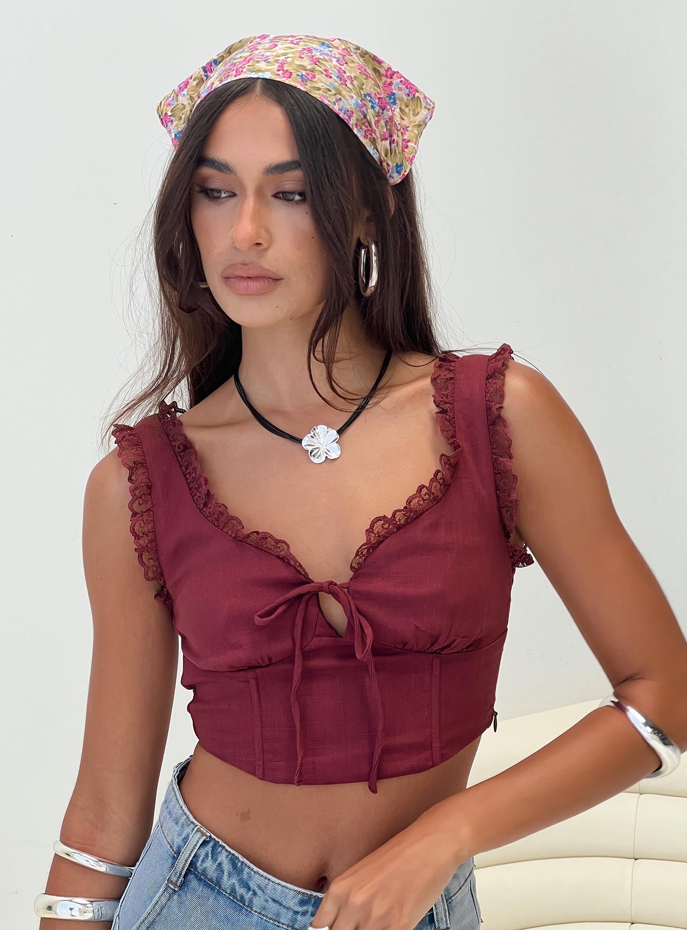 front view of model wearing Princess Polly Scarlett Top Wine Sleeveless V-Neck 