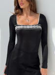 front view of model wearing Princess Polly Keating Long Sleeve Bodysuit Black Full Sleeves 