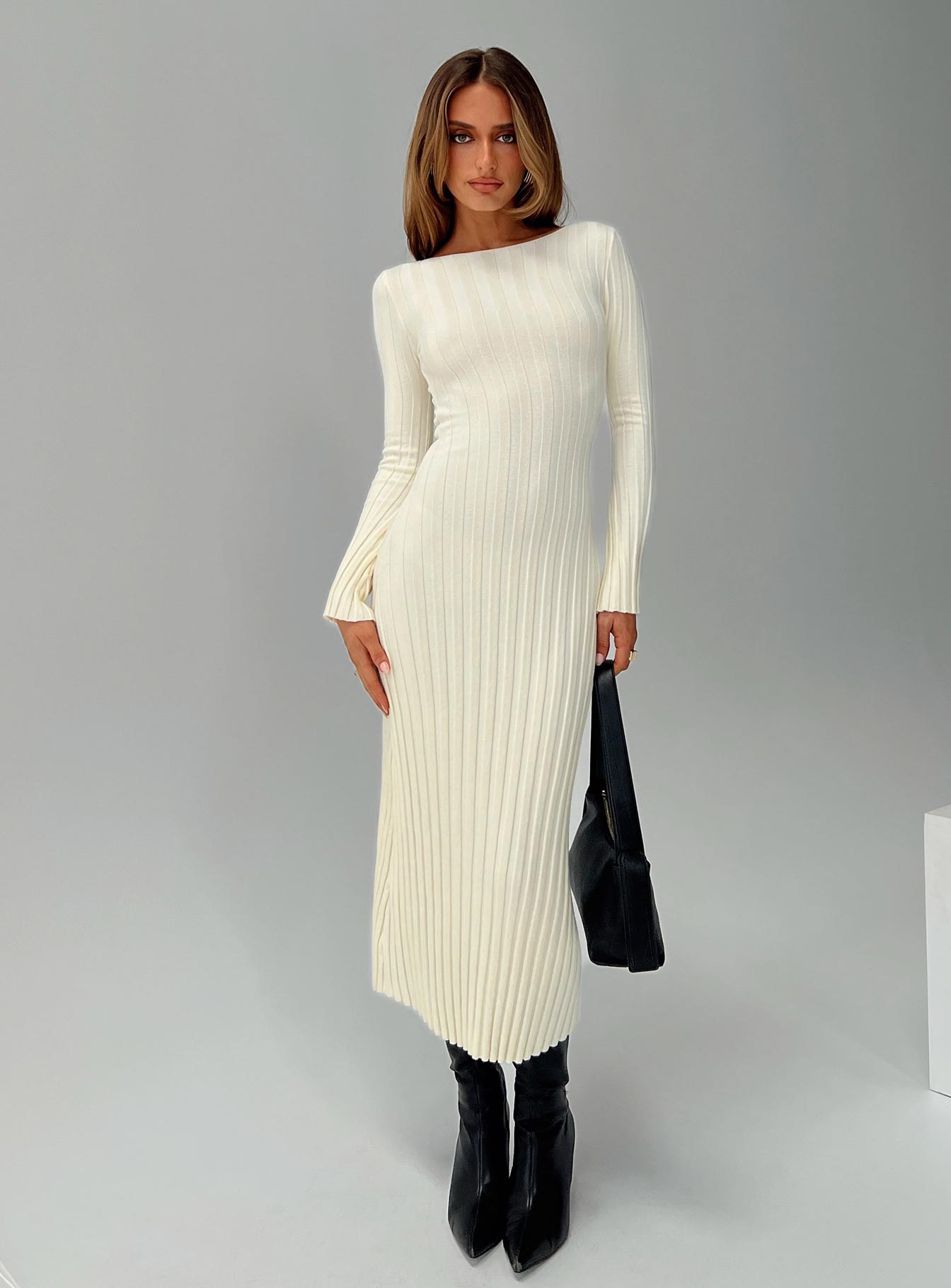 front view of model wearing Princess Polly Ryo Long Sleeve Rib Maxi Dress Cream Boat Neck 