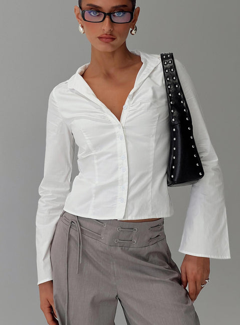 front view of model wearing Princess Polly Arianwyn Long Sleeve Shirt White Full Sleeves V-Neck 