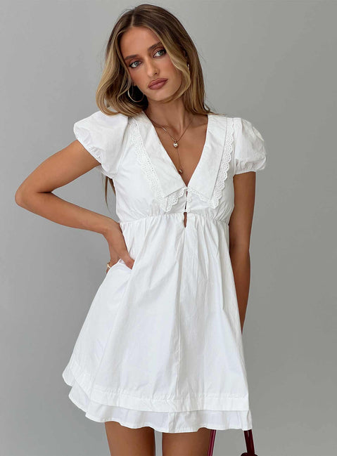 front view of model wearing Princess Polly Sailoh Puff Sleeve Baby Doll Mini Dress White V-Neck 