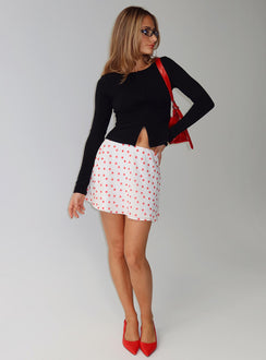   front view of model wearing Princess Polly Dapple Bias Mini Skirt White / Red Polka Mini Skirts 