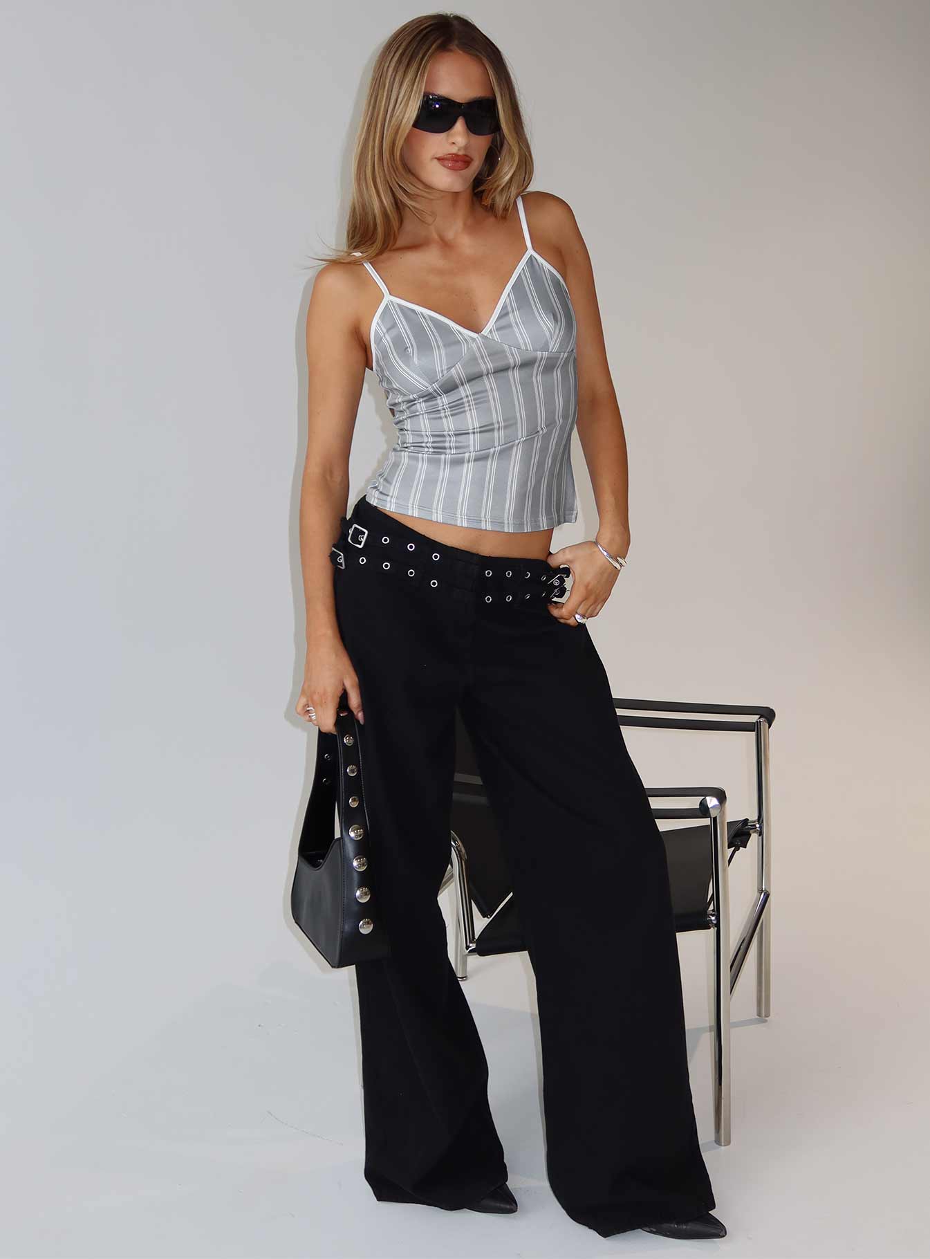 front view of model wearing Princess Polly Baccarat Belted Denim Pant Black Low Rise Jeans 