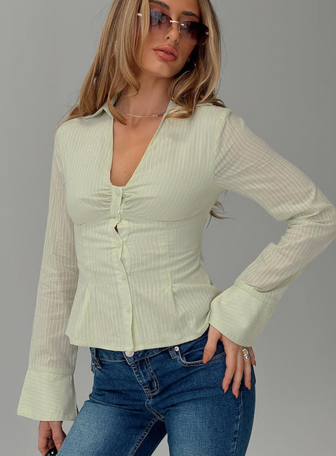 front view of model wearing Princess Polly Elowenn Long Sleeve Top Green Full Sleeves V-Neck 