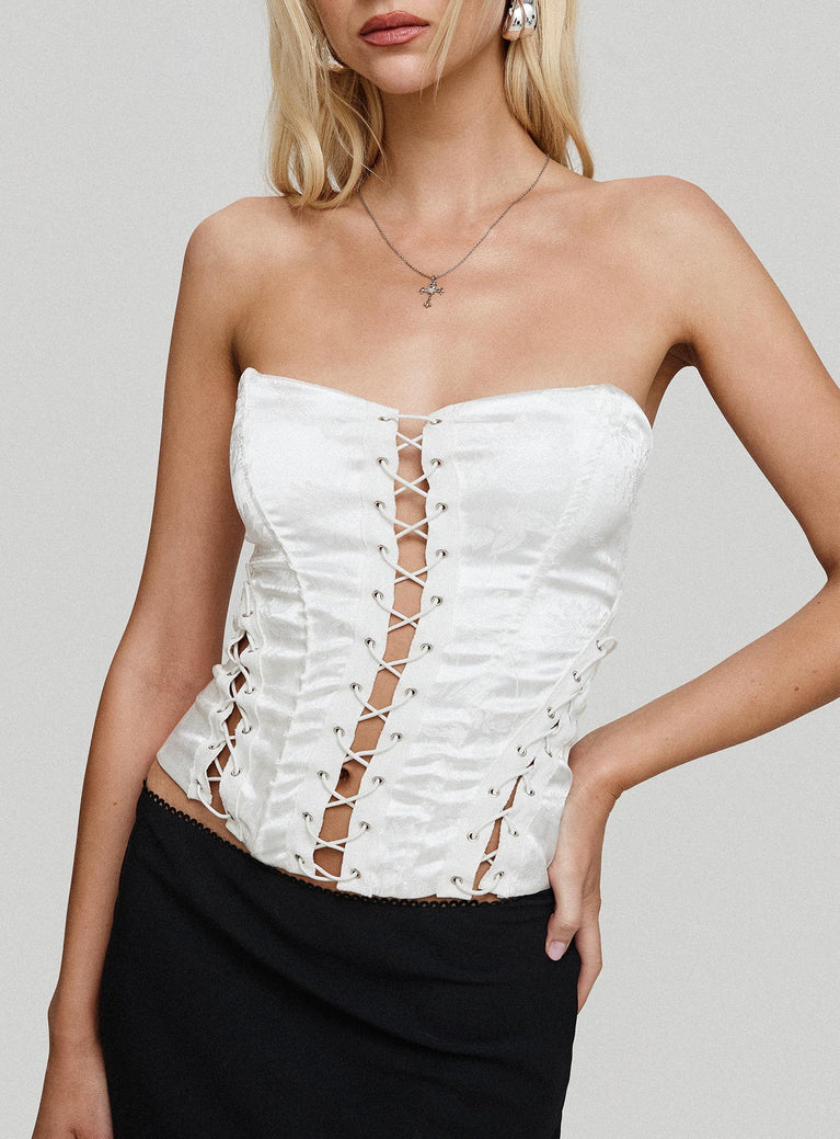 front view of model wearing Princess Polly Mochi Corset Top White Sleeveless Sweetheart 