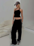 front view of model wearing Princess Polly Doors Open Pant Black Low Rise Pants 