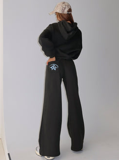 back view of model wearing Princess Polly Princess Polly Stargirl Wide Leg Sweat Pants Charcoal High Rise Pants 