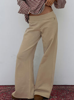 side view of model wearing Princess Polly Summits Flared Track Pants Latte Mid Rise Pants 