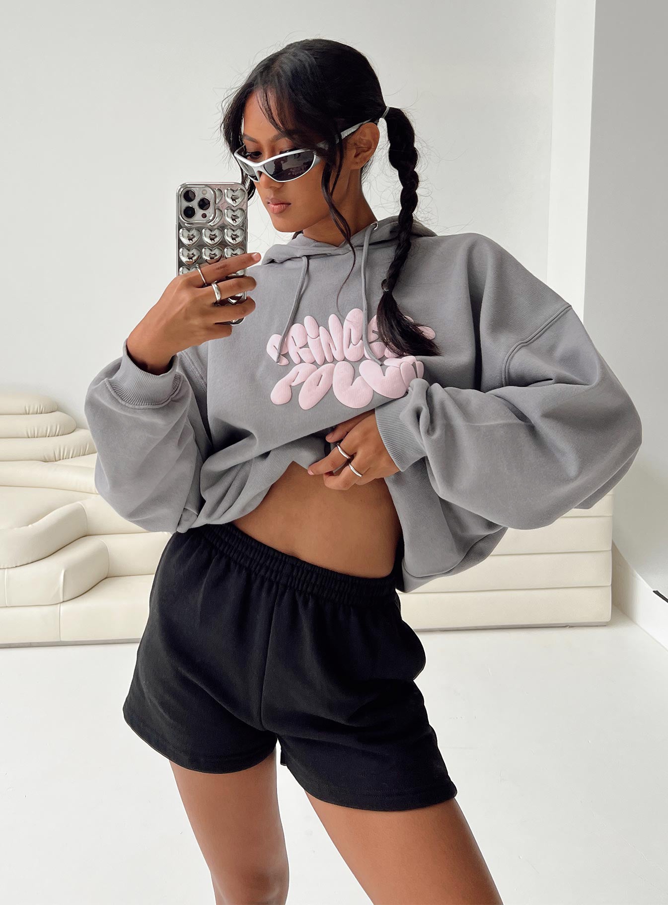 front view of model wearing Princess Polly Cenzo Track Shorts Black High Waisted Shorts 