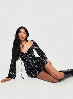 Polka dot romper Square neckline, tie fastening at bust, invisible zip fastening at back Non-stretch material, fully lined