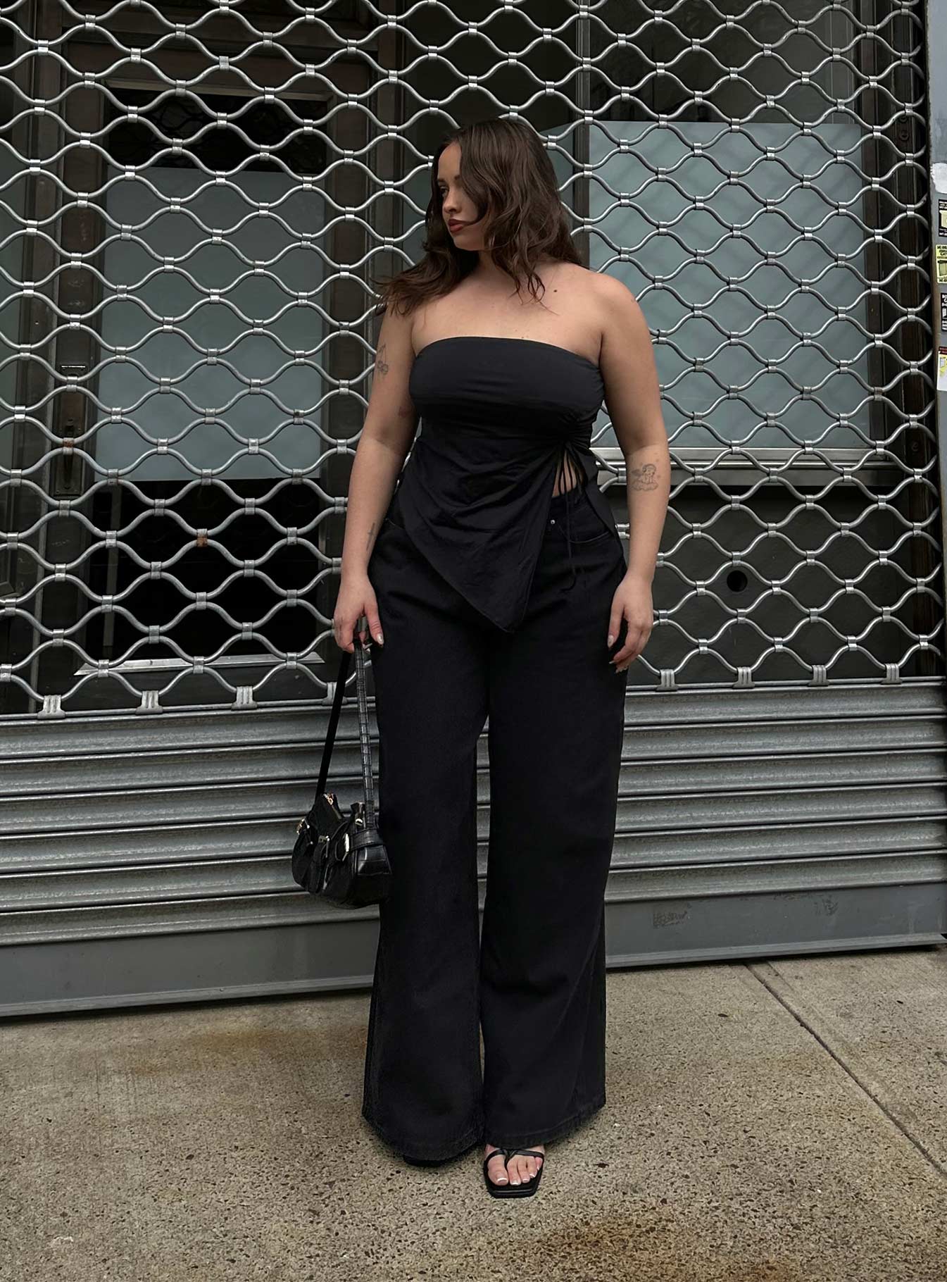 front view of model wearing Princess Polly Naylor Wide Leg Jeans Washed Black Denim Petite High Waisted 