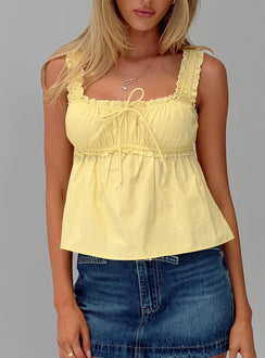 front view of model wearing Princess Polly Thalira Top Yellow Sleeveless Square Neck 