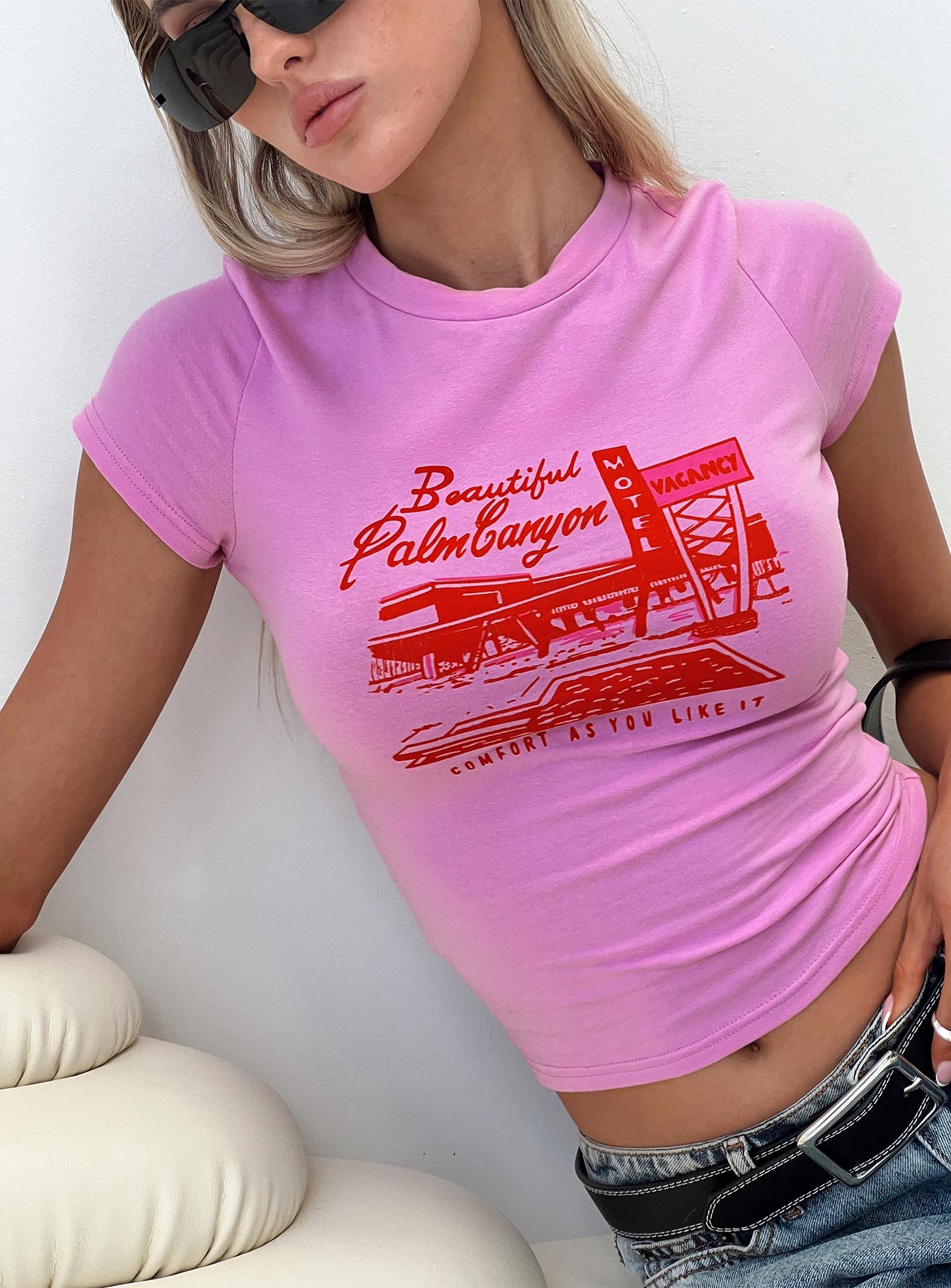 front view of model wearing Princess Polly Palm Canyon Tee Pink Short Sleeves Crew Neck 