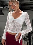 front view of model wearing Princess Polly Honeymoon Lace Top White Full Sleeves V-Neck 