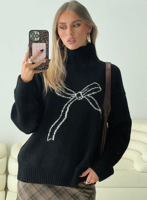 front view of model wearing Princess Polly Shes So Sweet Bow Knit Sweater Black Long 