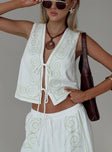 front view of model wearing Princess Polly Kindred Tie Top White / Green Sleeveless Plunger 