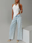 front view of model wearing Princess Polly Brayden Low Rise Relaxed Jeans Light Acid Wash Low Rise Jeans 